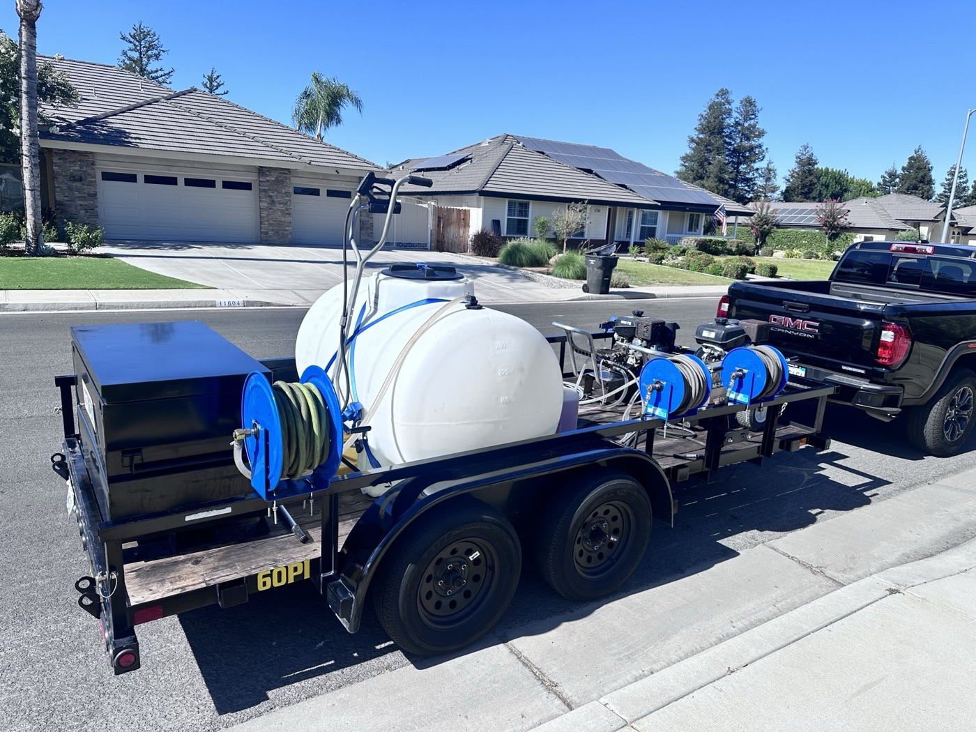 Powered H2O's mobile pressure-washing rig on the job in a Bakersfield neighborhood